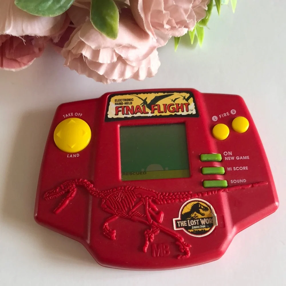 Jurassic Park The Lost World Electronic Hand Held Game 1996 Milton Bradley VTG
